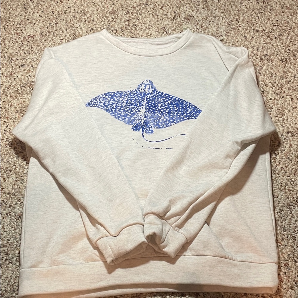 Cozy Cream Sweater with Blue Manta Ray Design